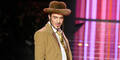 Modedesigner John Galliano macht Profit