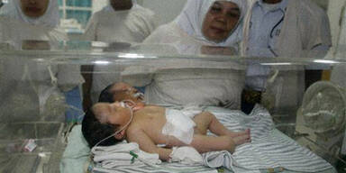 060810_indonesien_maedchenmitzweikoepfen