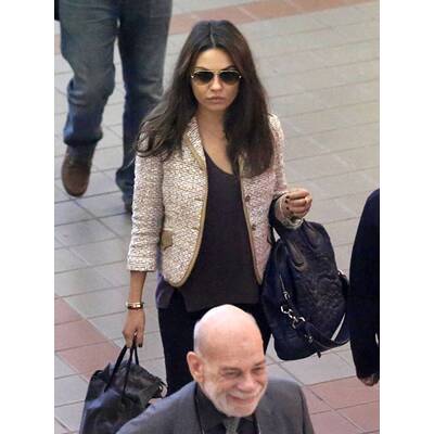 Ashton Kutcher & Mila Kunis am Flughafen