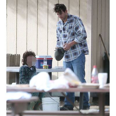 Ashton Kutcher angelt mit unbekanntem Kind