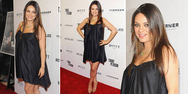 Mila Kunis versucht ihre Baby-Kugel zu verstecken