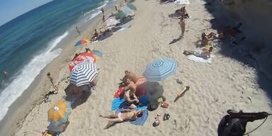 Paragleiter landet auf Sonnenbader