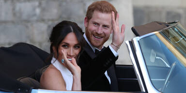 Meghan Harry Jaguar