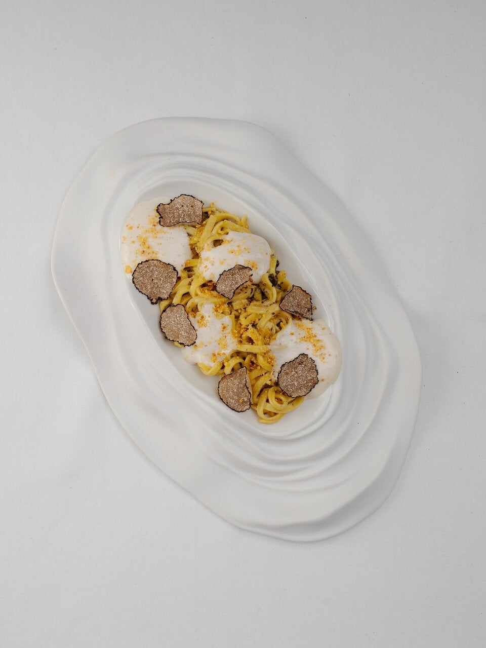 Köstliche Pasta: Homemade Tagliolini mit Alba-Trüffel.