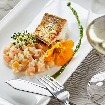 Zandermedaillons auf  Kürbisrisotto 