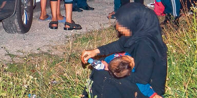Schlepper bet&auml;ubten Fl&uuml;chtlings- Kinder
