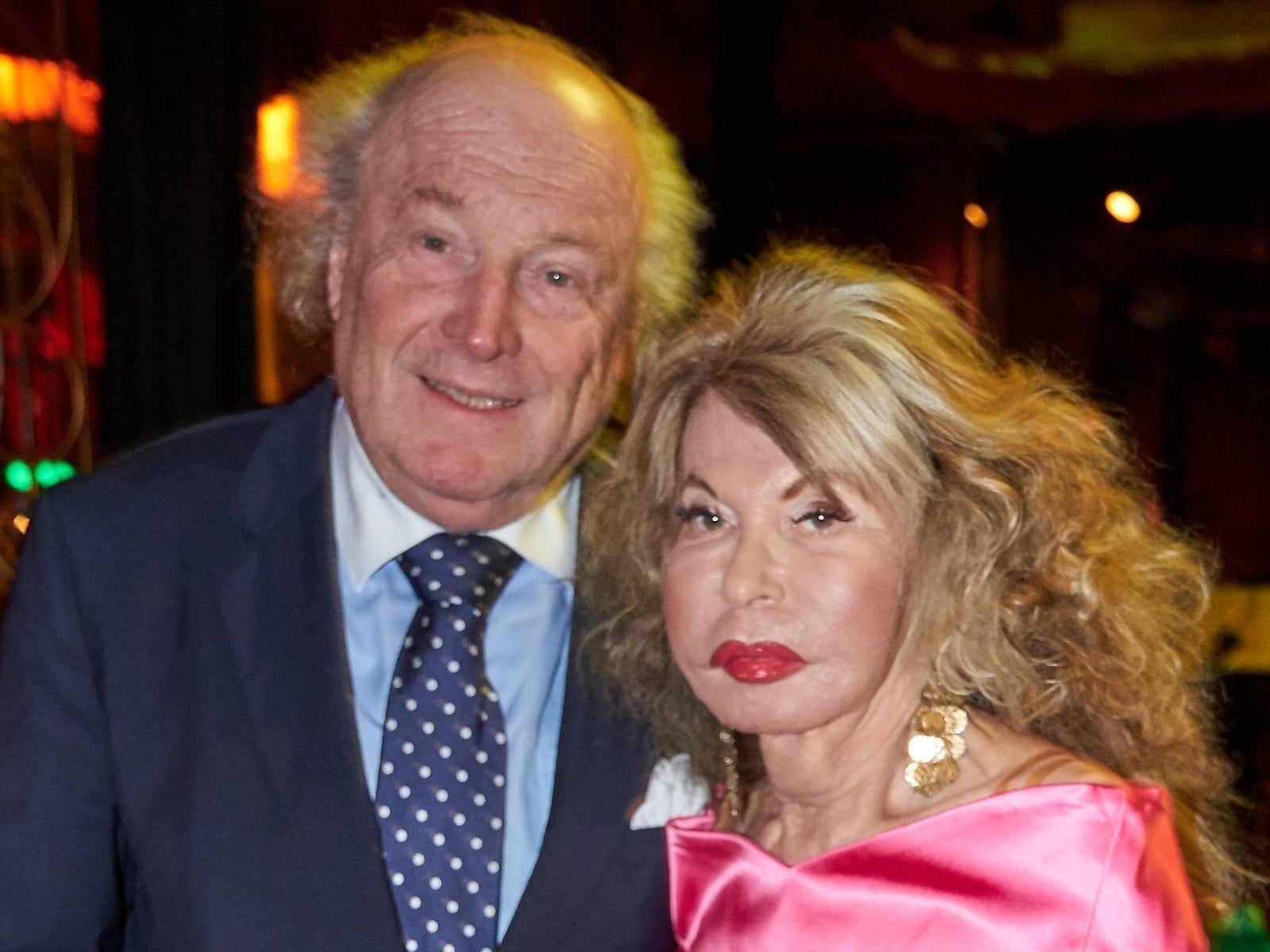 A classic guitar its strings humming with untold stories