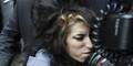 Amy Winehouse auf dem Weg zum Gericht