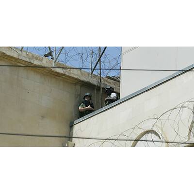 (c) AP Photo/Hussein Malla