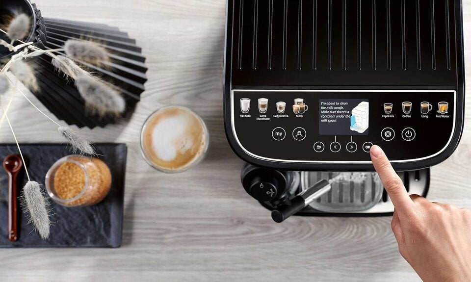 De’Longhi Magnifica Evo Next - Perfetto Kaffeevollautomat mit LatteCrema-Milchaufschäumer, 13 One-Touch-Getränke, Coffee- und Cappuccino Kaffeemaschine, farbiges Touch-Display, Titan 