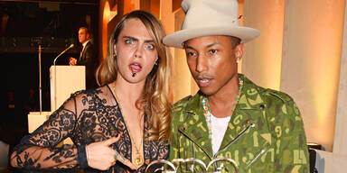 Cara Delevingne und Pharrell Williams