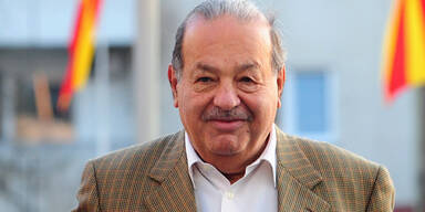 Slim fixiert Telekom-Deal