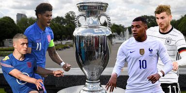 EM-Trophäe mit Freistellern von Marcus Rashford, Phil Foden (beide England) , Kylian Mbappe (Frankreich) und Timo Werner (Deutschland)