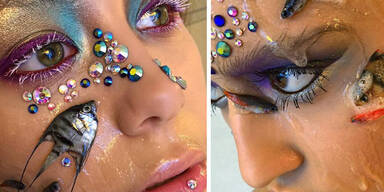 Visagistin macht Make-Ups mit toten Fischen
