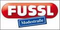 Österreichische Mini-Modekette Fussl klagt asiatischen Giganten Temu