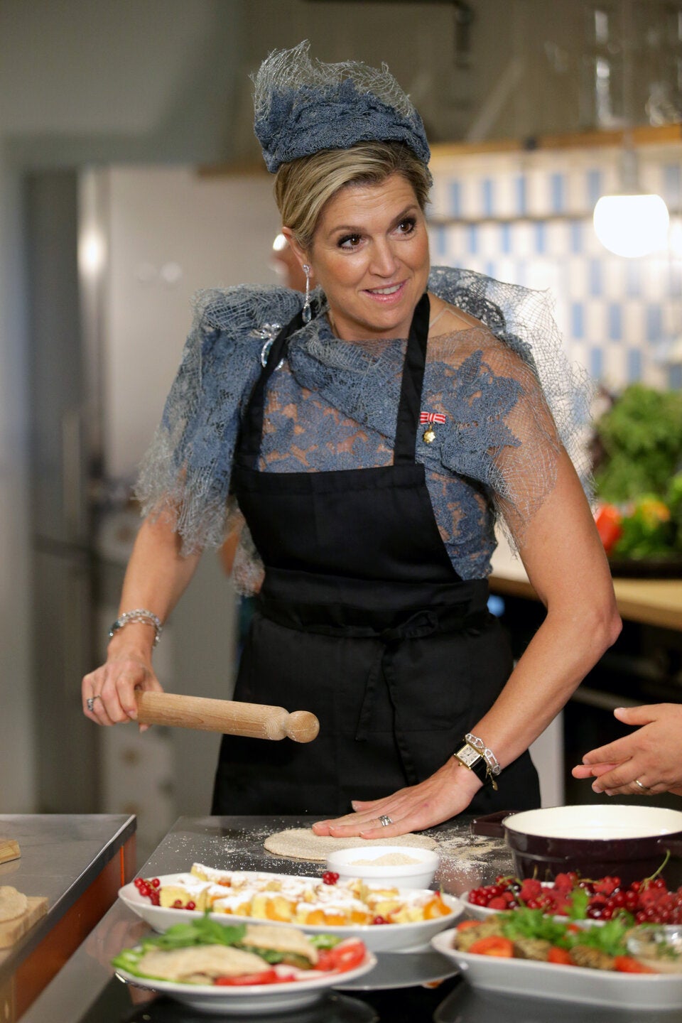 Die Royals beim Besuch eines Mittagstischs.