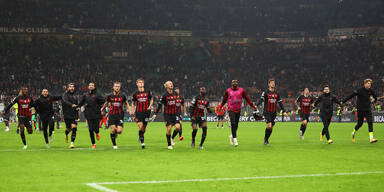 Milan celebrating