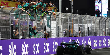 Aston Martin celebrating