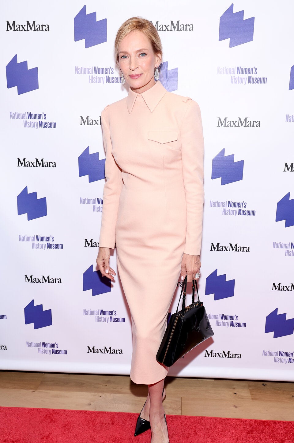 Zarter Pfirsichton: Uma Thurman trägt Prada.