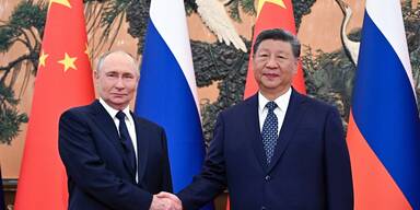 Xi