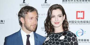 Anne Hathaway & Adam Shulman