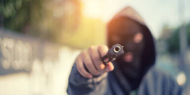 Angreifer Waffe Pistole Schießerei