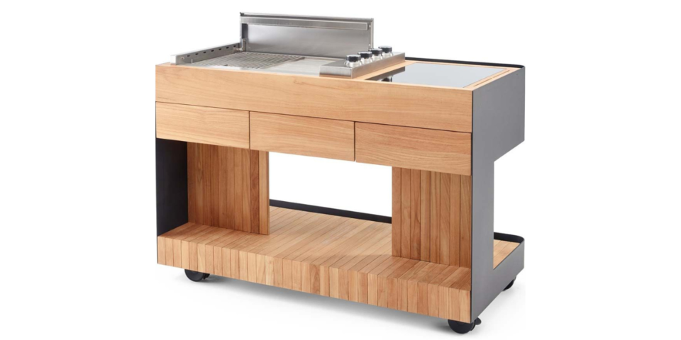 Die Bilba Trolley Outdoorküche mit Gasgrill und Induktionsplatte kann an jeden beliebigen Ort gerollt werden. Bei Trolley „Bilba“ kommen Teakholz und mattschwarzes, pulverbeschichtetes Aluminium zum Einsatz. 