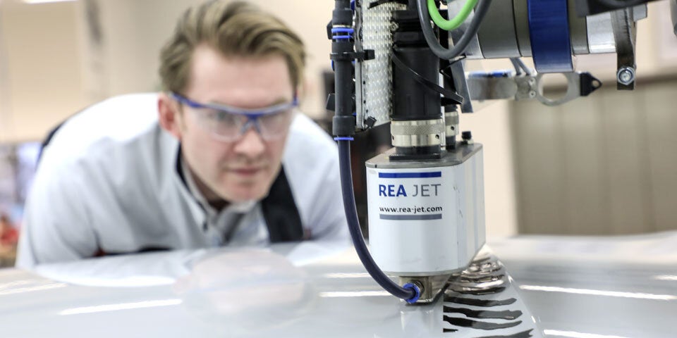 Porsche revolutioniert Karosserie-Lackierung