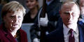 Putin Merkel