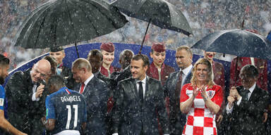 Regen Putin Macron Grabar-Kitarović