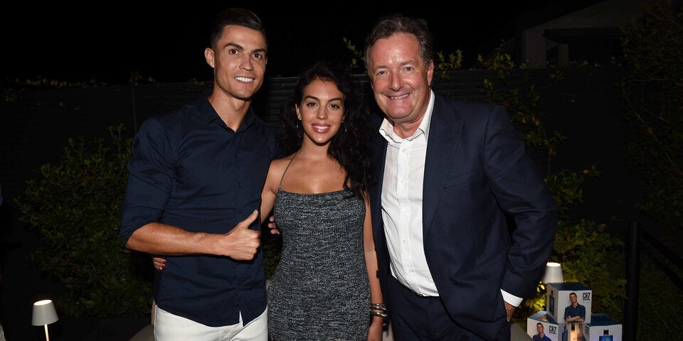 Fußballstar Cristiano Ronaldo mit Freundin Georgina und Journalist Pierce Morgan