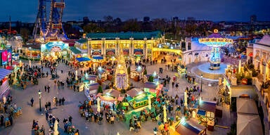 Österreichs größter Wintermarkt lässt Riesenrad erstrahlen