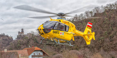 Felsbrocken stürzt auf Arbeiter Hubschrauber