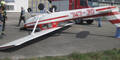 Windböe warf Flugzeug aufs Dach
