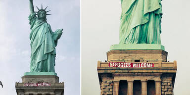 „Refugees Welcome“-Banner an der Freiheitsstatue gehisst