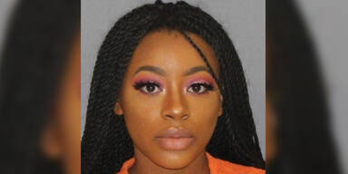 Wegen eines Details geht ihr Polizei-Foto um die Welt