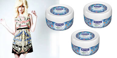 Designerkleid plus Nivea-Cremen