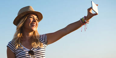 Wer auf Profilbildern l&auml;chelt ist zufriedener