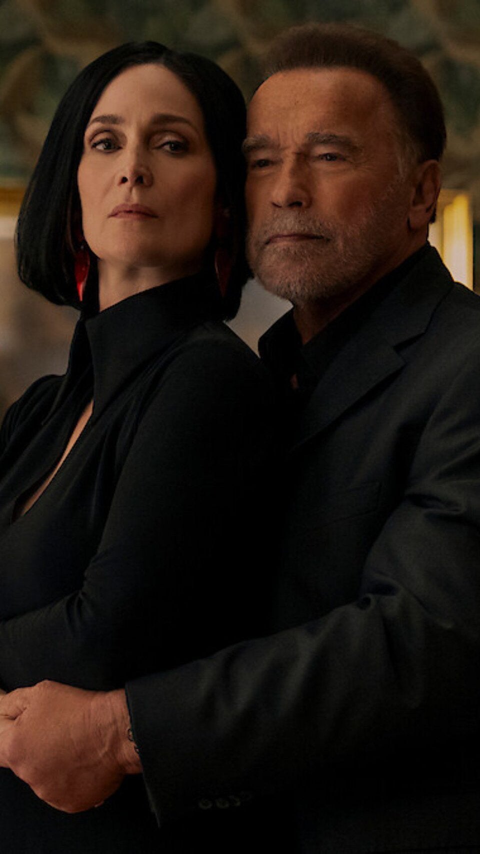 Arnold Schwarzenegger und Carrie Anne Moss