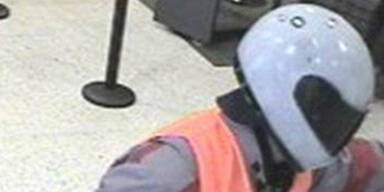 Bankräuber schießt zwei Menschen nieder 