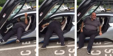 Dicker Mann kommt nicht aus BMW