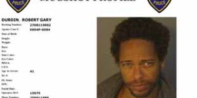 csi-star gary dourdan polizeifoto