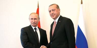 erdogan_putin_thump.jpg