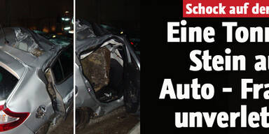 Felsbrocken trifft fahrendes Auto