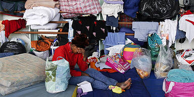 fl?chtlinge_AP Photo/Jacques Brinon