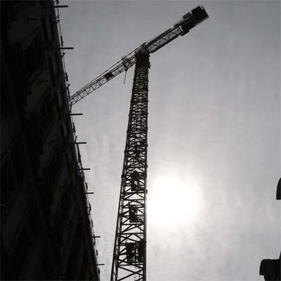 Einwanderer protestieren auf Baukränen