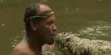 Fischer und Krokodil sind beste Freunde