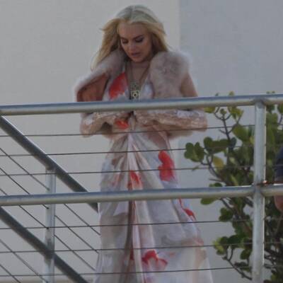 Lindsay Lohan in Miami: Busenblitzer bei Kampagnen-Shoot