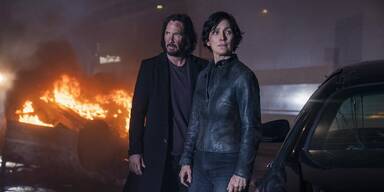 Keanu Reeves (Neo / Thomas Anderson), Carrie-Anne Moss (Trinity / Tiffany)