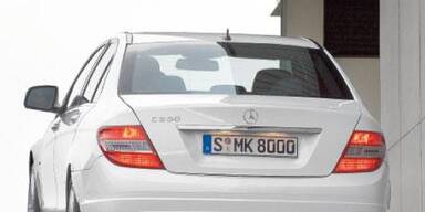 Sportler im Nadelstreifanzug